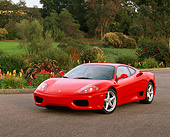 FRR 04 RK0197 01
1999 Ferrari 360 Modena Red Front 3/4 View On Pavement By Flowers And Trees