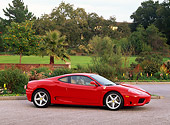 FRR 04 RK0200 01
1999 Ferrari 360 Modena Red Side 3/4 View Pavement With Trees And Shrubs