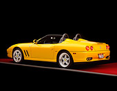 FRR 04 RK0216 07
2001 Ferrari Barchetta Yellow 3/4 Rear View On Red Floor Gray Line Studio