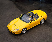 FRR 04 RK0218 14
2001 Ferrari Barchetta Yellow Overhead 3/4 Side View On Pavement