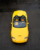 FRR 04 RK0220 06
2001 Ferrari Barchetta Yellow Overhead Front View On Pavement