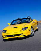 FRR 04 RK0243 02
2001 Ferrari Barchetta Yellow 3/4 Front View On Pavement Hill Blue Sky