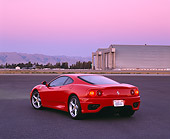 FRR 04 RK0267 01
1999 Ferrari 360 Modena Red Rear 3/4 View On Pavement By Hangar Filtered