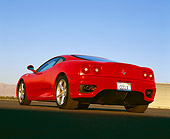 FRR 04 RK0268 01
1999 Ferrari 360 Modena Red Low 3/4 Rear View On Pavement Blue Sky