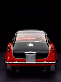 FRR 04 RK0273 03
1955 Ferrari 375 MM Sport Competitione Speciale Red And Black Rear View Studio