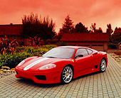 FRR 04 RK0306 01
2004 Ferrari 360 Challenge Stradale Red White Stripe 3/4 Front View On Driveway