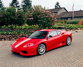 FRR 04 RK0308 02
2004 Ferrari 360 Challenge Stradale Red White Stripe 3/4 Front View On Driveway