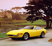FRR 04 RK0386 01
1973 Ferrari GTB Yellow 3/4 Side View On Pavement By Water And Trees