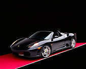 FRR 04 RK0403 01
2005 Ferrari F430 Spider Black 3/4 Front View On Red Floor Studio