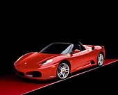 FRR 04 RK0407 01
2005 Ferrari F430 Spider Red 3/4 Front View On Red Floor Studio