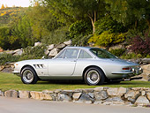 FRR 04 RK0588 01
1967 Ferrari 330 GTC Silver 3/4 Rear View On Grass By Trees