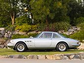 FRR 04 RK0590 01
1967 Ferrari 330 GTC Silver Profile View On Grass By Trees