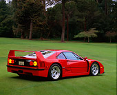 FRR 06 RK0024 01
1990 Ferrari F-40 Red 3/4 Rear View On Grass Trees Background