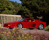 FRR 07 RK0071 04
1992 Ferrari Testarosa Red Low 3/4 Front View By Flowers Gate Trees