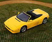 FRR 08 RK0063 06
1994 Ferrari 348 Spyder Yellow Overhead 3/4 Side View On Grass