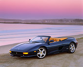 FRR 08 RK0077 01
1995 Ferrari F355 Spyder Blue 3/4 Side View On Sand On Beach