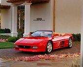 FRR 08 RK0097 02
1994 Ferrari 348 Spyder Red Front 3/4 View By Flowers And Building