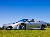 FRR 08 RK0122 02
2007 Ferrari F430 Spider Silver Front 3/4 View On Grass By Trees Sky