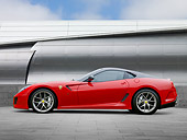 FRR 09 RK0057 01
2011 Ferrari 599 GTO Red Profile View On Pavement By Metal Structure