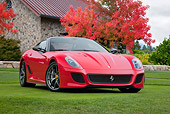 FRR 09 RK0059 01
2011 Ferrari 599 GTO Red 3/4 Front View On Grass By Stone Building And Autumn Trees