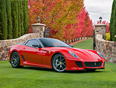 FRR 09 RK0060 01
2011 Ferrari 599 GTO Red 3/4 Front View On Grass By Stone Gate And Autumn Trees
