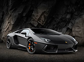 LAM 01 RK0773 01
2012 Lamborghini Aventador Black 3/4 Front View On Gravel By Stone Wall