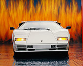 LAM 01 RK0139 10
1985 Lamborghini Countach White Head On Shot Flames Background Studio
