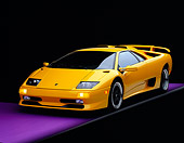LAM 01 RK0156 08
1999 Lamborghini SV Diablo Yellow 3/4 Front View On Purple Floor Gray Line Studio