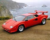LAM 01 RK0426 04
Lamborghini Countach Red 3/4 Front View On Dirt Ocean And Rocks In Background Foggy