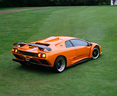 LAM 01 RK0448 03
1994 Lamborghini GT Orange Overhead 3/4 Rear View On Grass