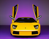 LAM 01 RK0450 04
2002 Lamborghini Murcielago Yellow Head On View Purple Floor Studio