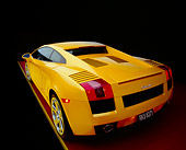 LAM 01 RK0529 01
2004 Lamborghini Gallardo Yellow 3/4 Rear View On Red Floor Yellow Line Studio