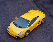 LAM 01 RK0530 09
2004 Lamborghini Gallardo Yellow Overhead 3/4 Front View On Pavement