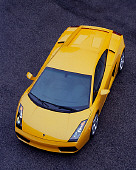 LAM 01 RK0531 04
2004 Lamborghini Gallardo Yellow Overhead 3/4 Front View On Pavement