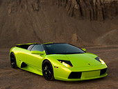 LAM 01 RK0578 01
2006 Lamborghini Murcielago Roadster Lime Green 3/4 Front View On Sand