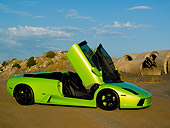 LAM 01 RK0587 01
2006 Lamborghini Murcielago Roadster Lime Green 3/4 Side View On Sand