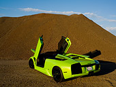 LAM 01 RK0589 01
2006 Lamborghini Murcielago Roadster Lime Green 3/4 Rear View On Sand
