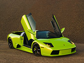LAM 01 RK0590 01
2006 Lamborghini Murcielago Roadster Lime Green 3/4 Front View On Sand
