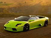 LAM 01 RK0592 01
2006 Lamborghini Murcielago Roadster Lime Green 3/4 Side View On Sand