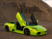 LAM 01 RK0594 01
2006 Lamborghini Murcielago Roadster Lime Green 3/4 Front View On Sand