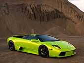 LAM 01 RK0595 01
2006 Lamborghini Murcielago Roadster Lime Green 3/4 Side View On Sand