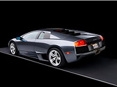 LAM 01 RK0629 02
2007 Lamborghini Murcielago LP640 Gray 3/4 Rear View Gray Floor Studio