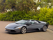 LAM 01 RK0665 01
2008 Lamborghini Murcielago LP640 Roadster Gray 3/4 Front View On Pavement