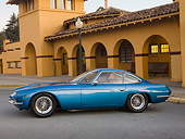 LAM 01 RK0686 01
1965 First Lamorghini 350GT Azure Blue Profile View On Pavement By Building