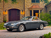 LAM 01 RK0698 01
1966 First Lamorghini 400GT 2+2 Touring Berlinetta Grigio Saint-Vincent (Dark Gray) 3/4 Front View On Driveway By House