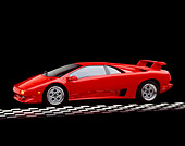 LAM 02 RK0001 06
1994 Lamborghini Diablo VT Red 3/4 Side View On Checkerboard Studio
