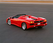 LAM 02 RK0031 01
1996 Lamborghini Diablo Roadster Red 3/4 Rear View On Pavement