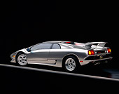 LAM 02 RK0048 05
1995 Lamborghini Diablo VT Silver 3/4 Rear View On Gray Line Studio