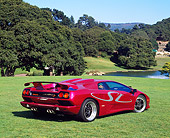 LAM 02 RK0111 02
1998 Custom Purple Lamborghini Diablo SV 3/4 Rear View On Grass By Lake And Trees Blue Sky