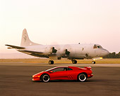 LAM 02 RK0116 01
1998 Lamborghini Diablo SV Red Profile View By Airplane At Dusk
